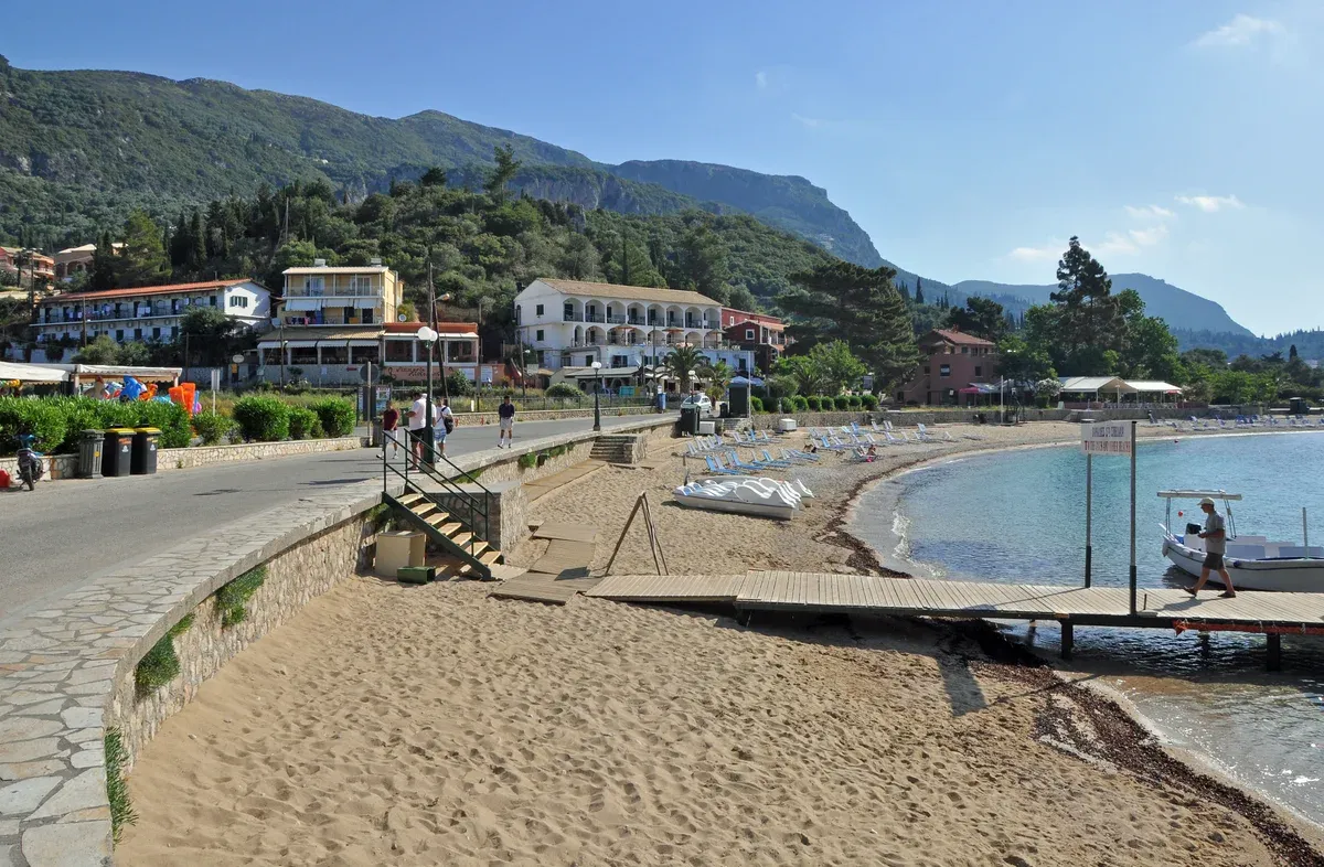 The main beach and boat jetty at Paleokastritsa on the west coast, start of a short Corfu boat tour
